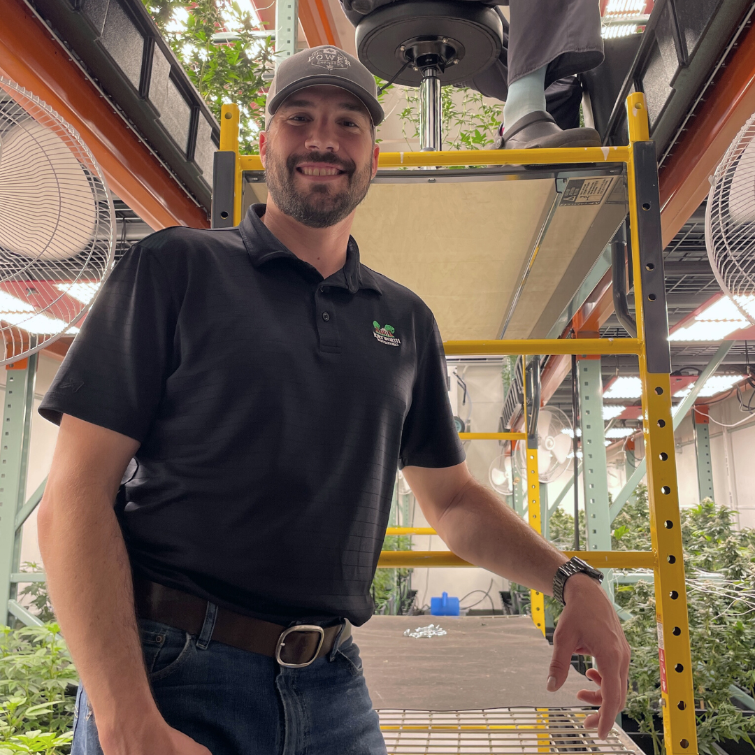 Colt Power in the flower room of his farm in Fort Worth