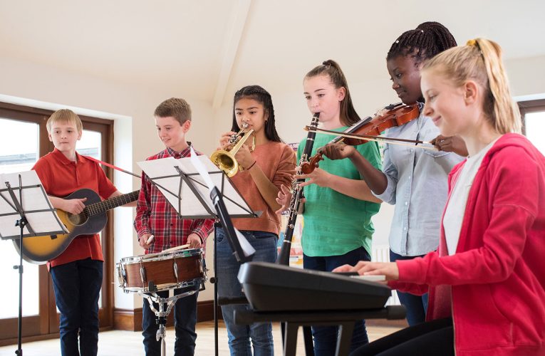 Raise Literacy Levels: Bring Music Back to All Schools